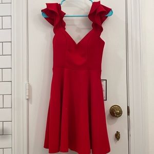 Red Macy’s Mini dress.